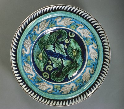 Charger, decorated in Persian colours with dolphins and ducks by William de Morgan